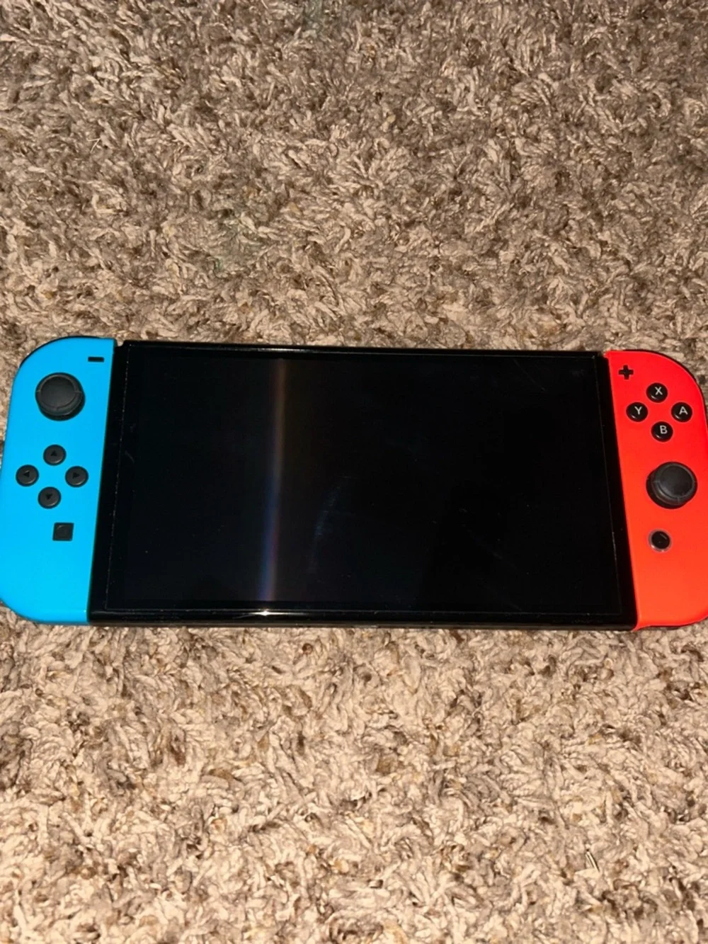 Nintendo Switch with Neon Blue Left & Neon Red Right Joy-Con